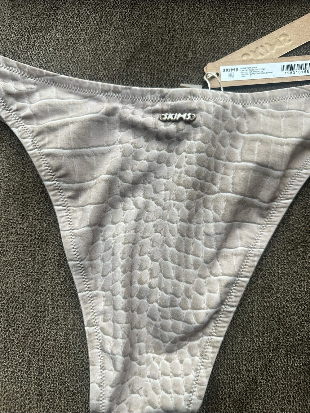 Skims set   signature swim cheeky tanga bottom and signature swin micro bandeau.